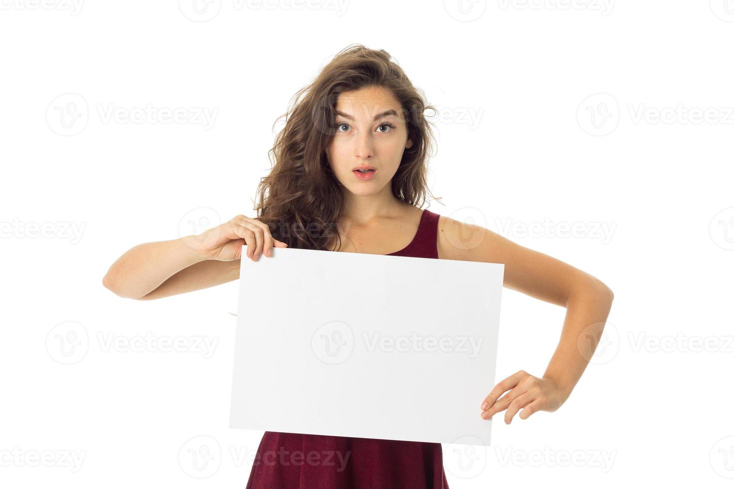 girl in red dress with white placard photo