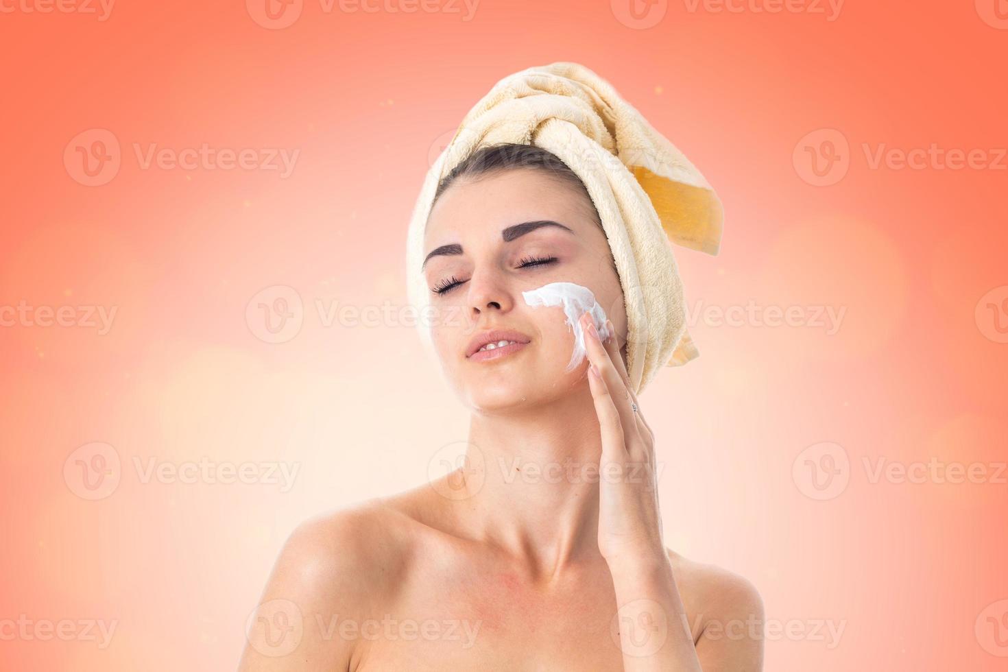 Young girl takes care her skin. photo