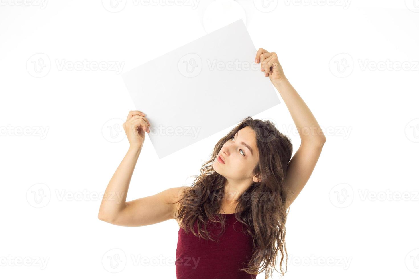 girl in red dress with white placard photo