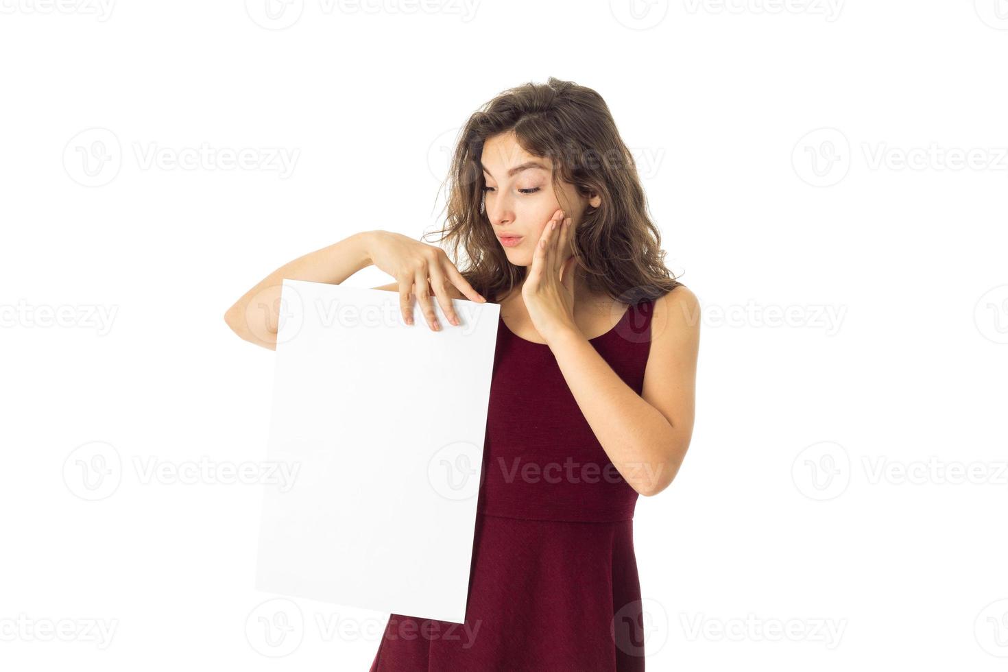 girl in red dress with white placard photo
