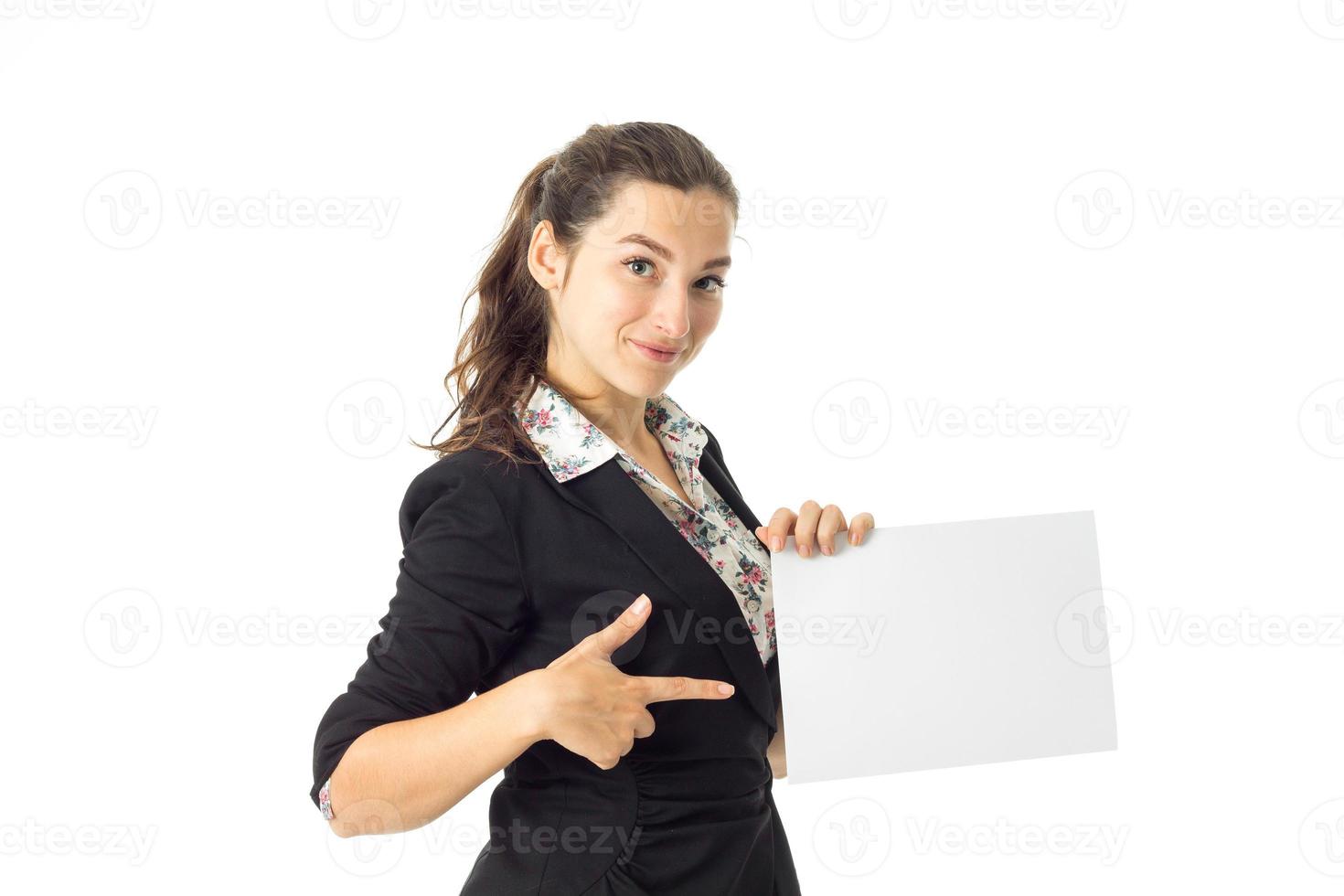 woman in uniform with white placard in hands photo