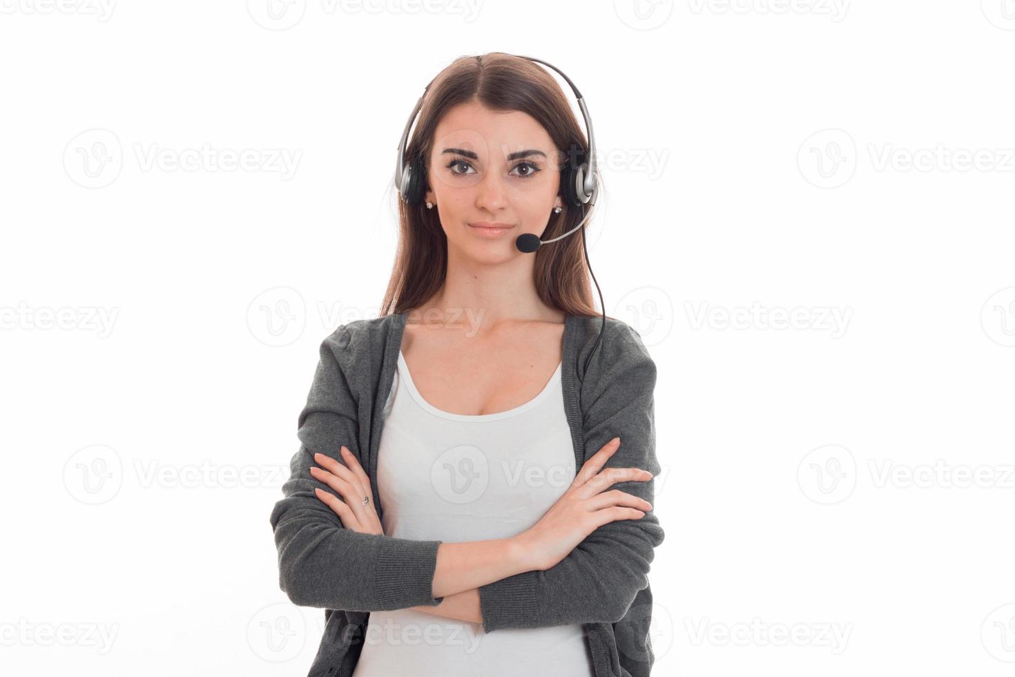 young beauty call office girl with headphones isolated on white background in studio photo