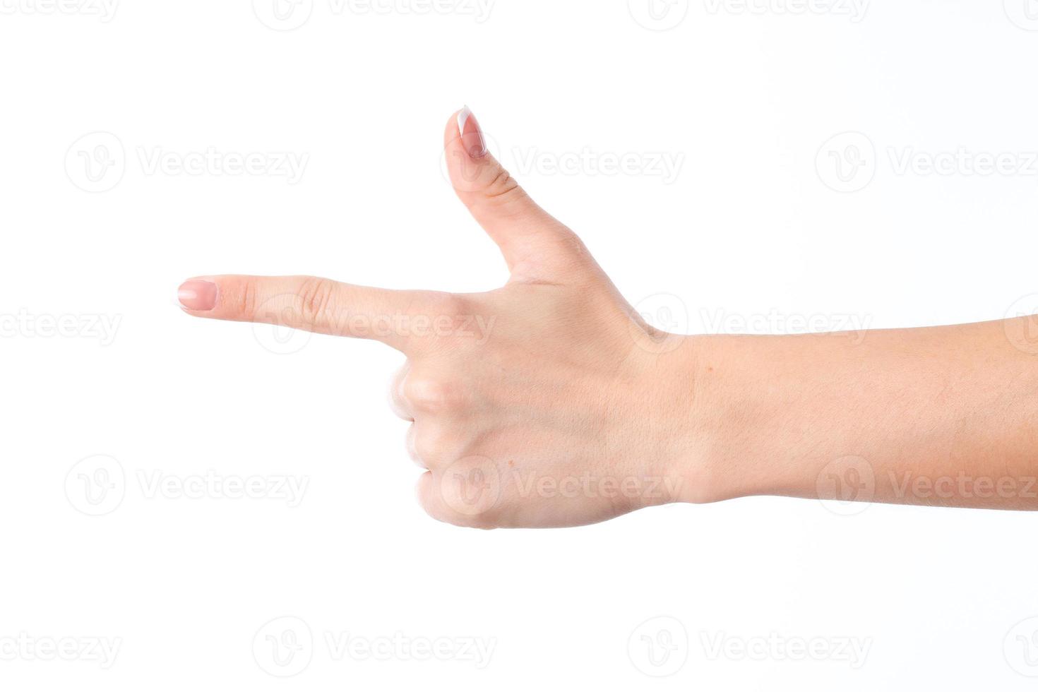female hand showing the gesture with index finger and raised up the thumb is isolated on a white background photo