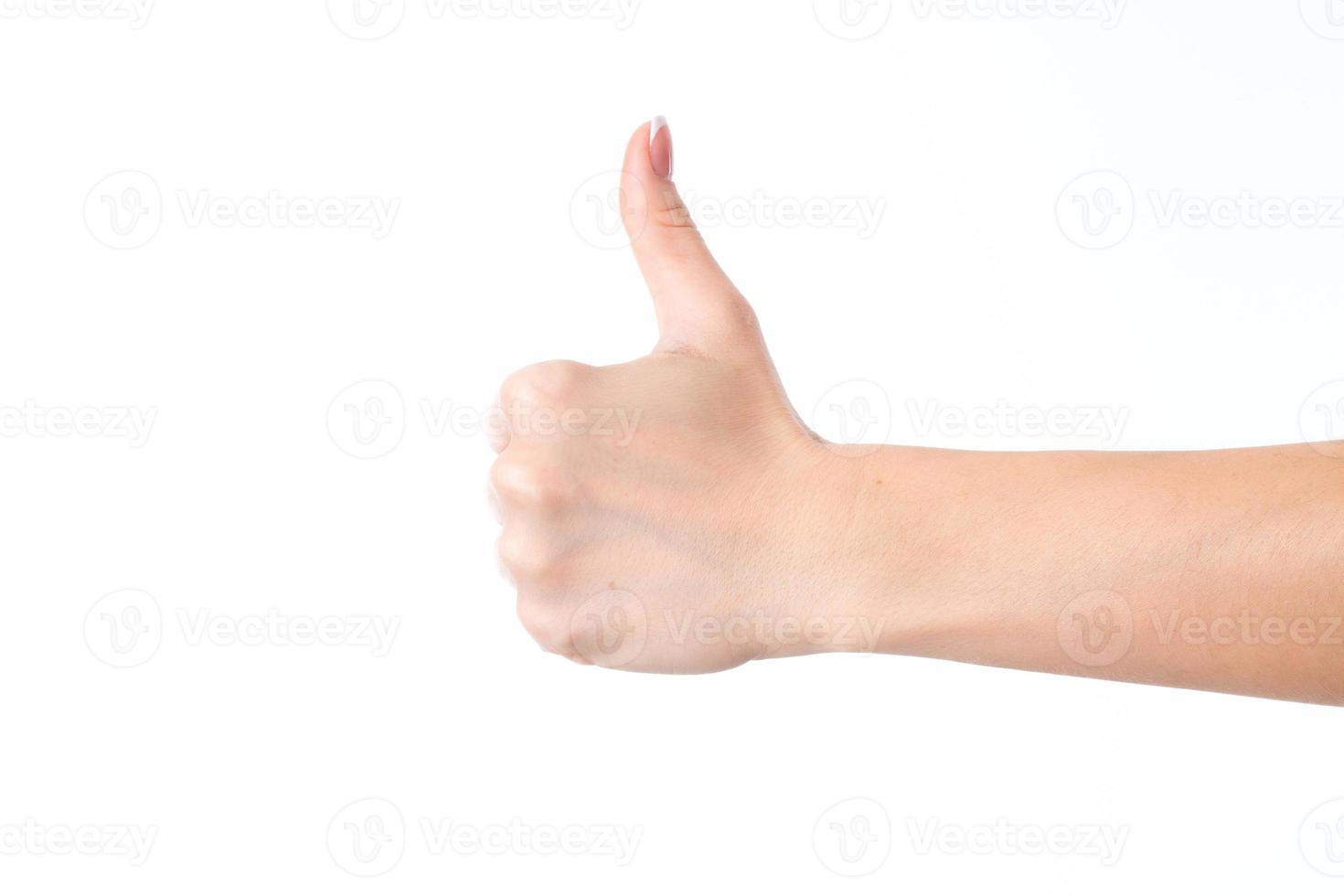 female hand outstretched to the side and showing the gesture class isolated on white background photo