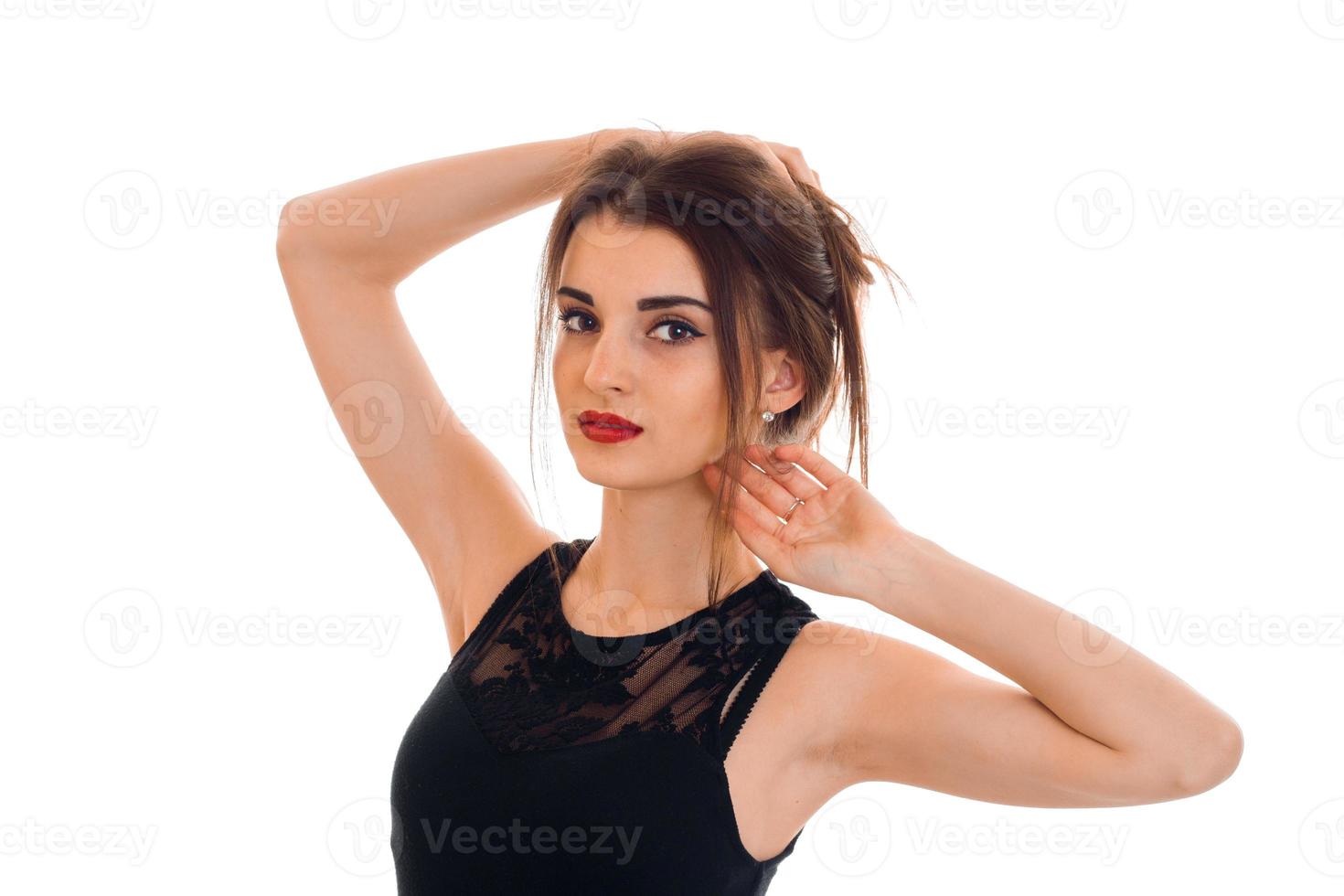 sexy young brunette woman with red lips posing isolated on white background photo