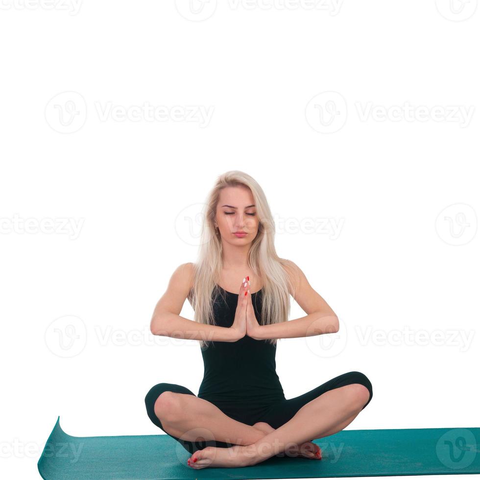 Woman practicing yoga photo