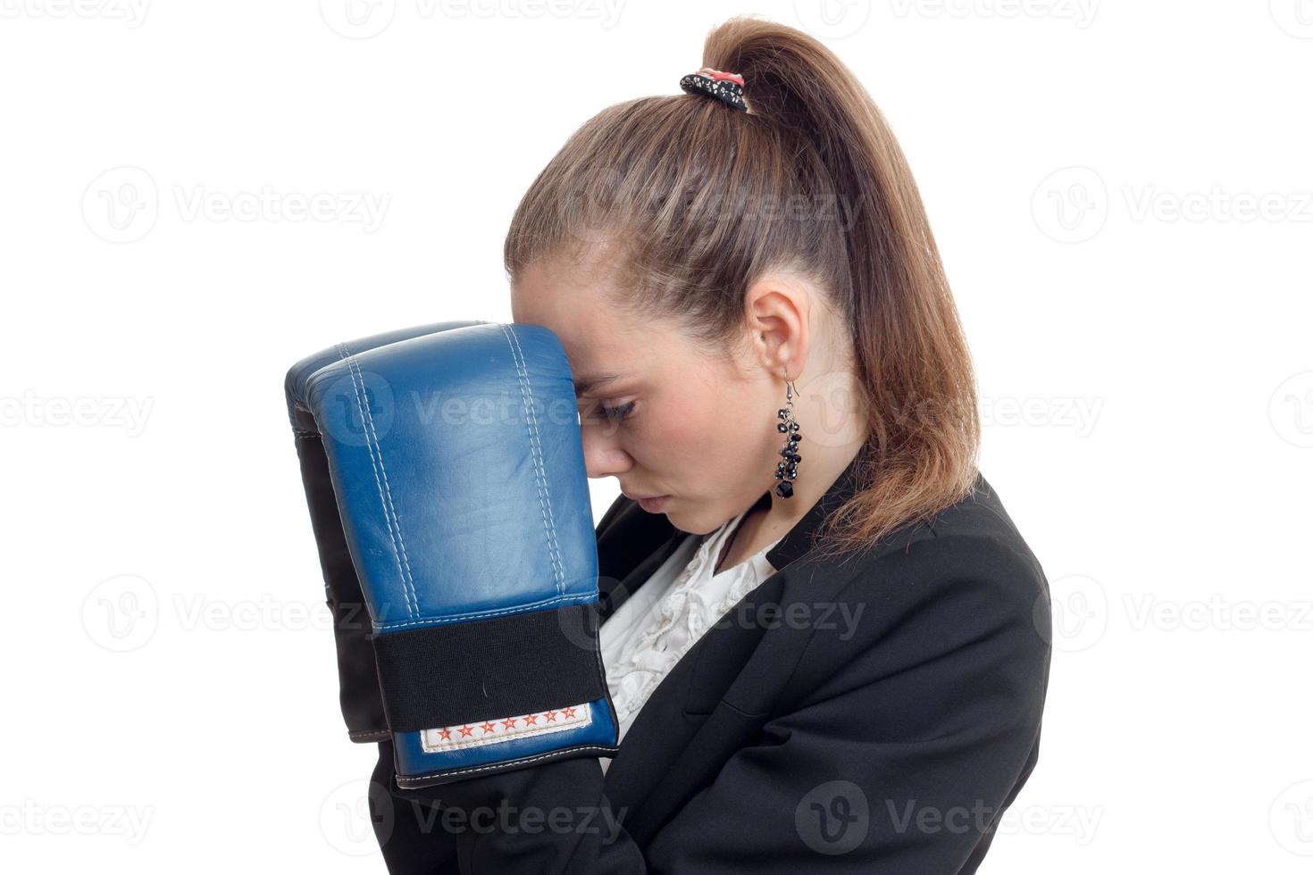 young blonde businwss woman in uniform and boxing gloves photo