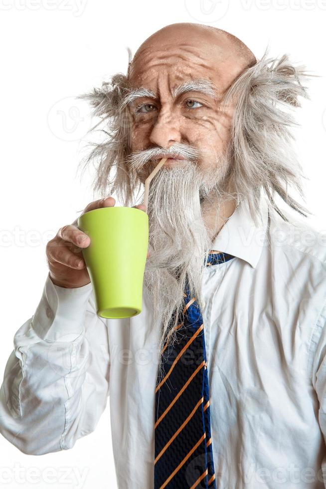 studio shot of bald elegant oldman with cup photo