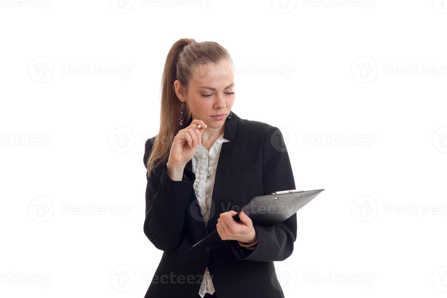 young beautiful girl wearing a business looks at Tablet photo