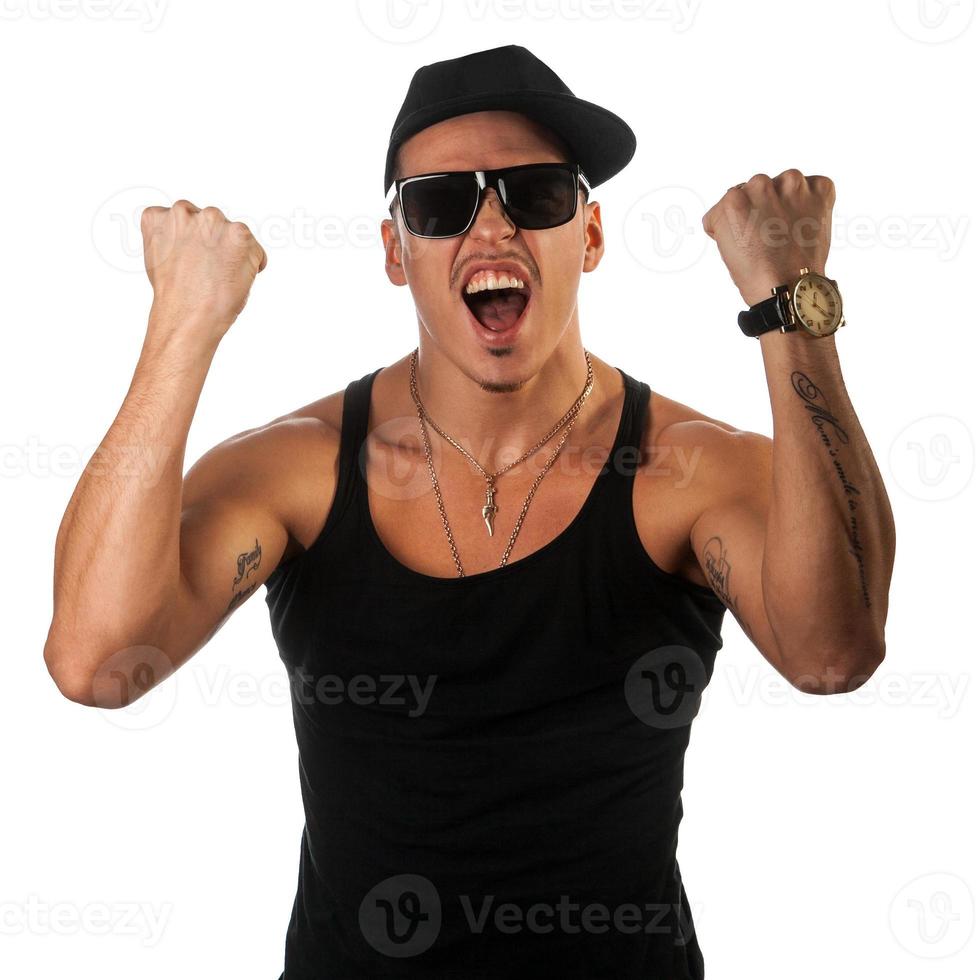 tattooed man screams in studio photo