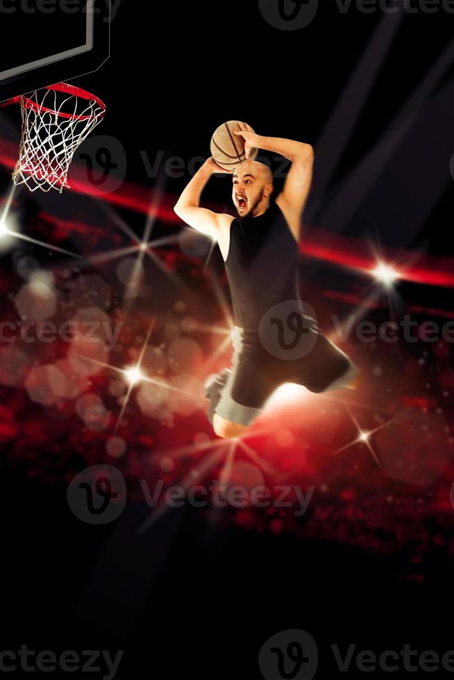 professional basketball player makes a slam dunk in the game photo