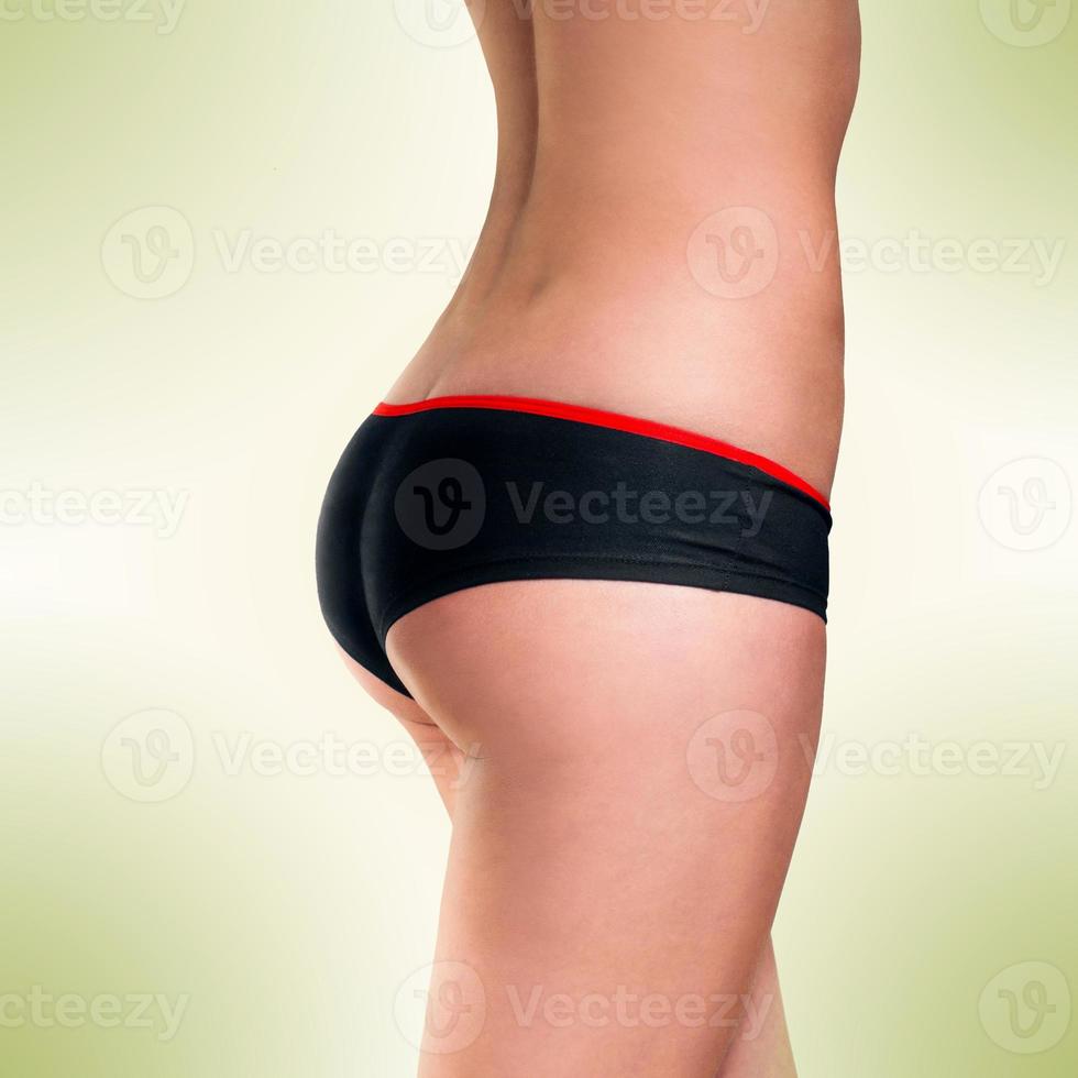 female bum in sports shorts photo