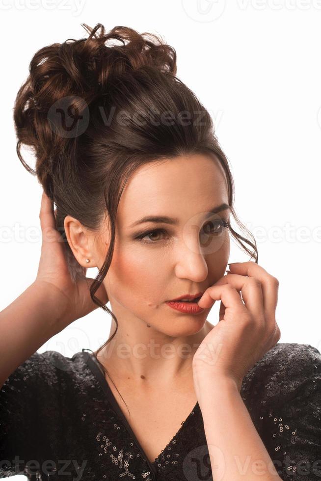 Charming adult brunette with beautiful hairstyle photo