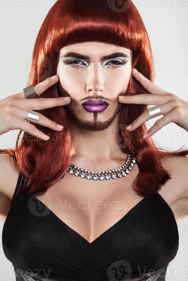 Beauty red hair shemale with beard and makeup photo