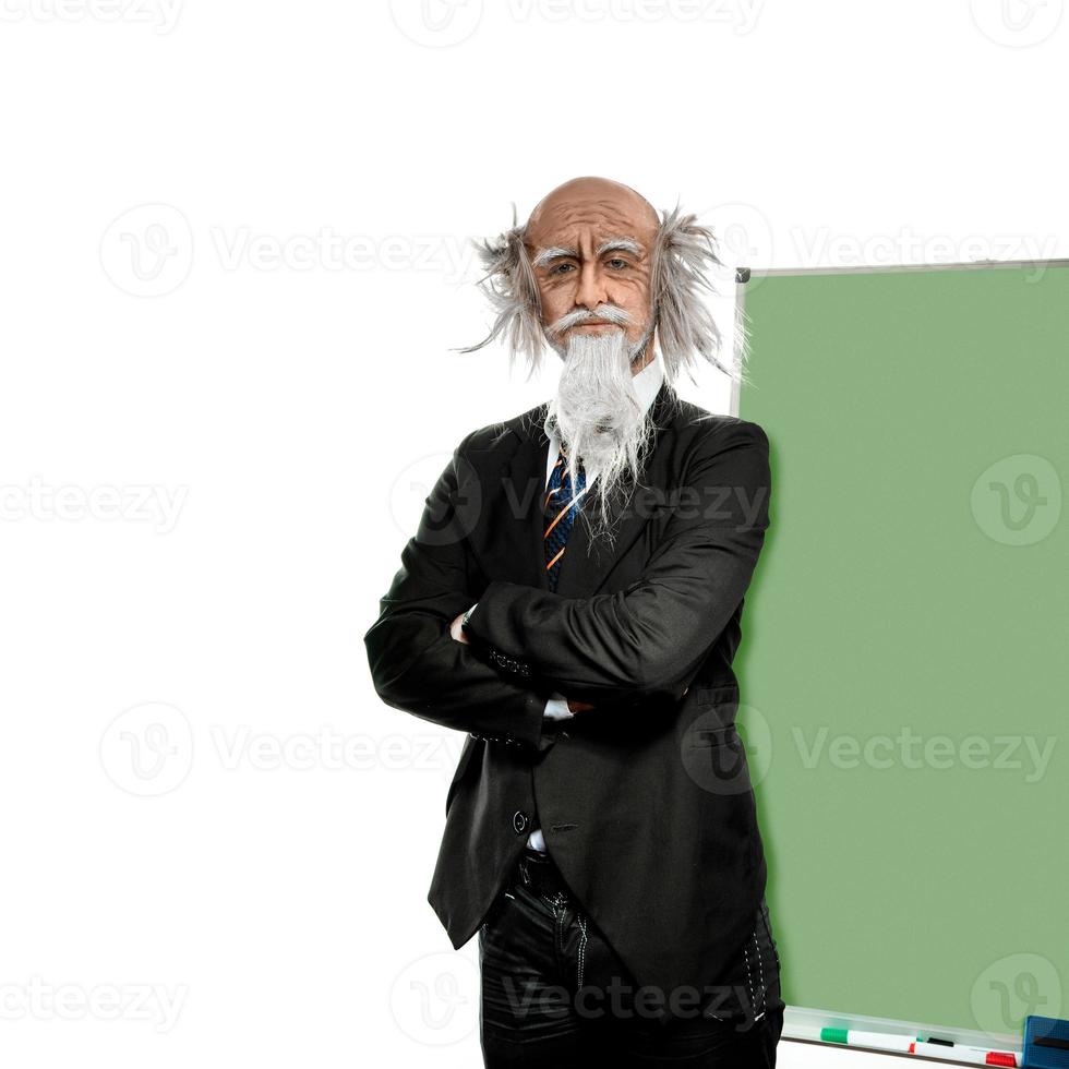 Old professor near balckboard isolated on white background photo