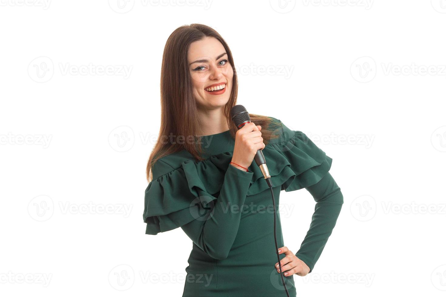 happy young woman sings a karaoke photo