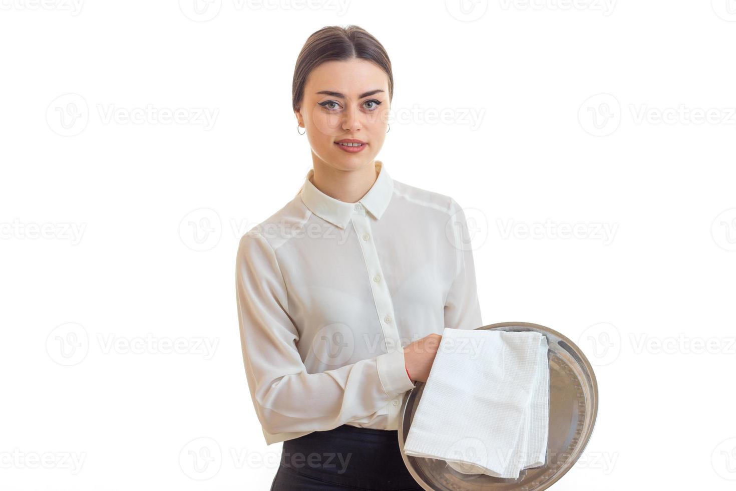 cute girl waitress in uniform with trey in hands photo