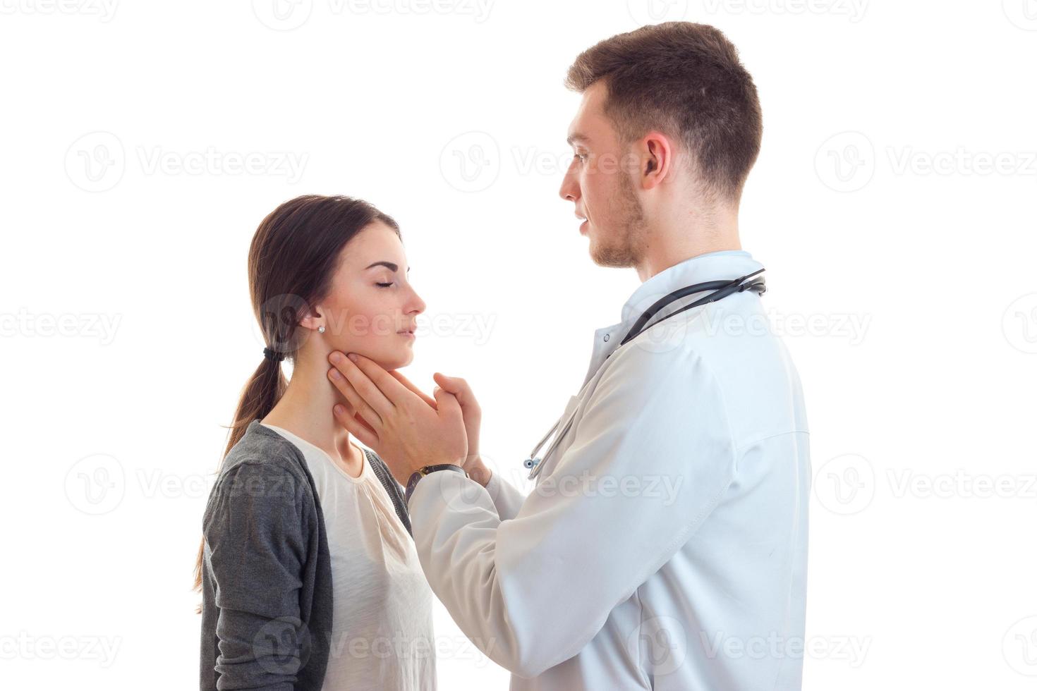 woman at doctor treats tonsils photo