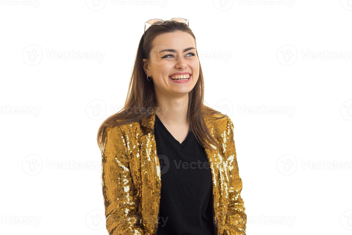 Portrait of a cheerful glamorous girl in the Golden jacket photo