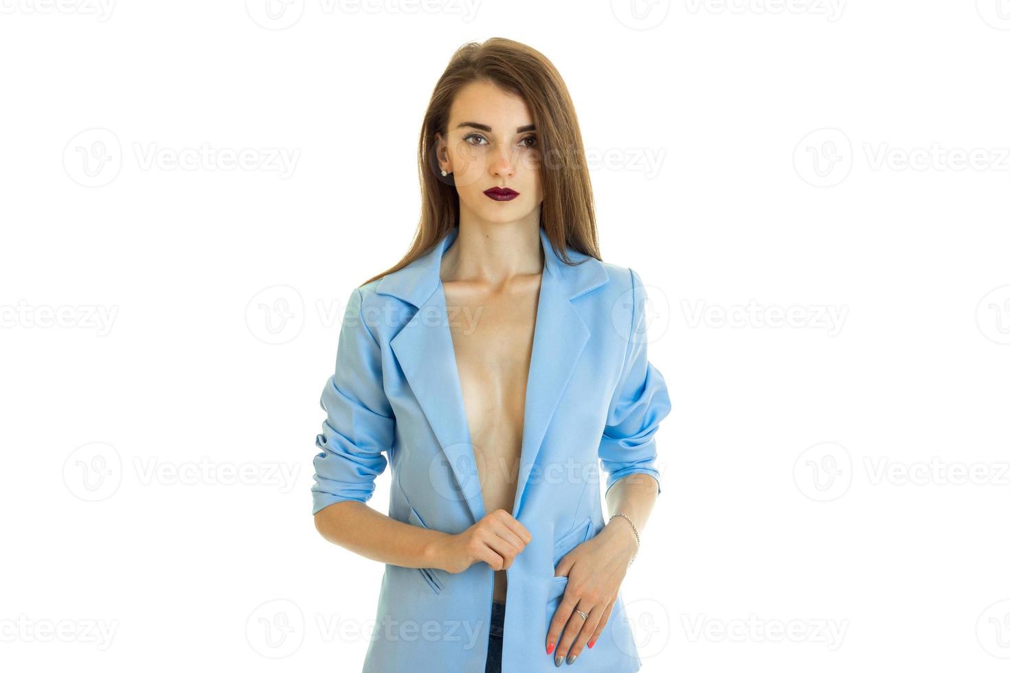 young charming business woman in blue jacket without bra photo