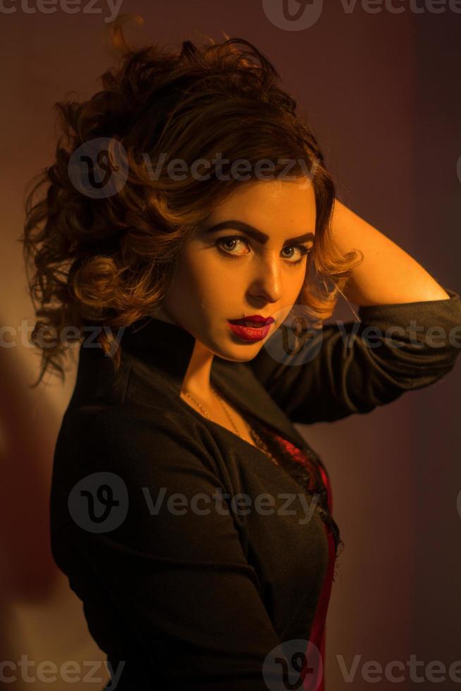 young curly lady with red lips photo