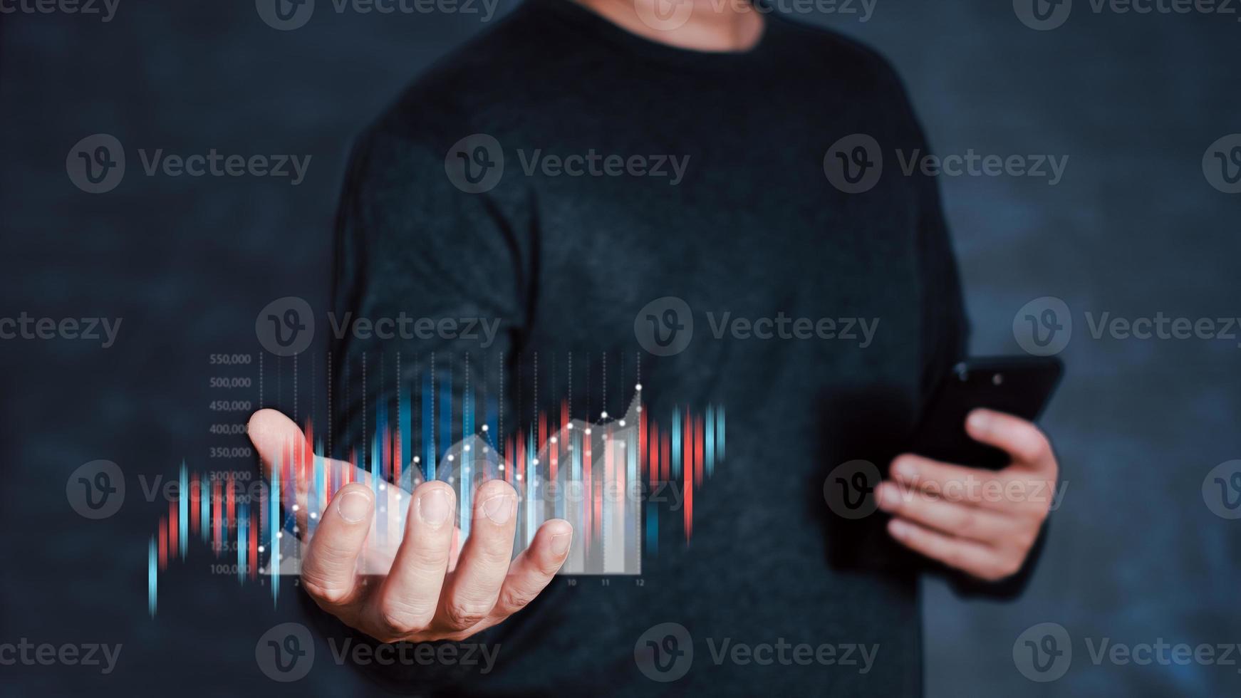 Businessmen draw growth graphs and progress of business and analyze financial, and investment.Use technology to plan strategy to success goals and growth.online business, e-commerce, online marketing. photo