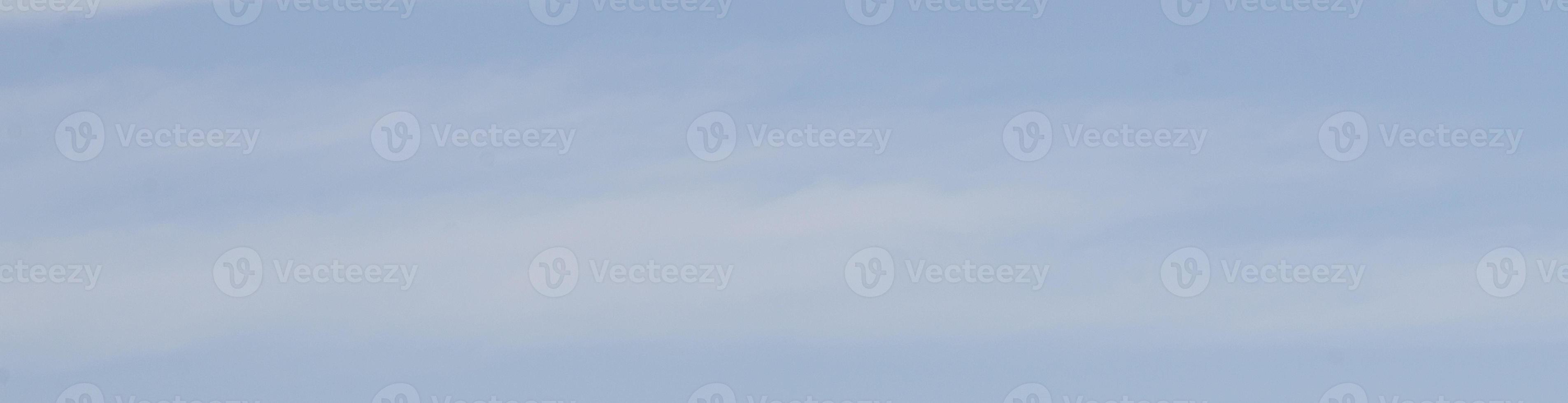 Image of a partly cloudy and partly clear sky during the day photo