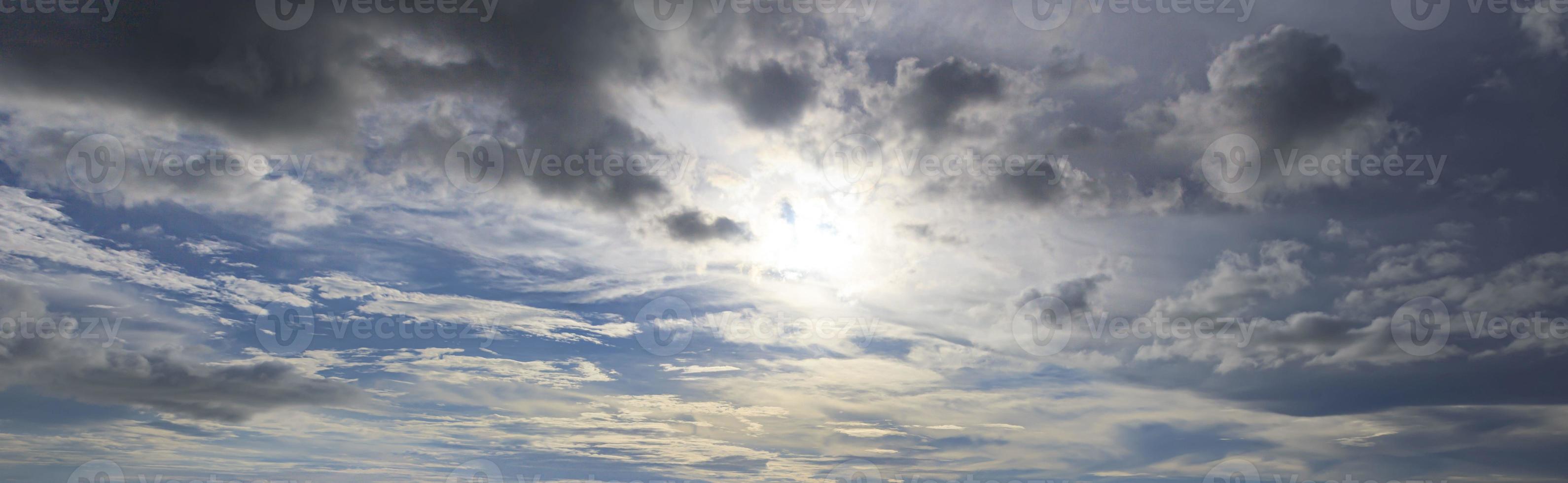 Image of a partly cloudy and partly clear sky during the day photo