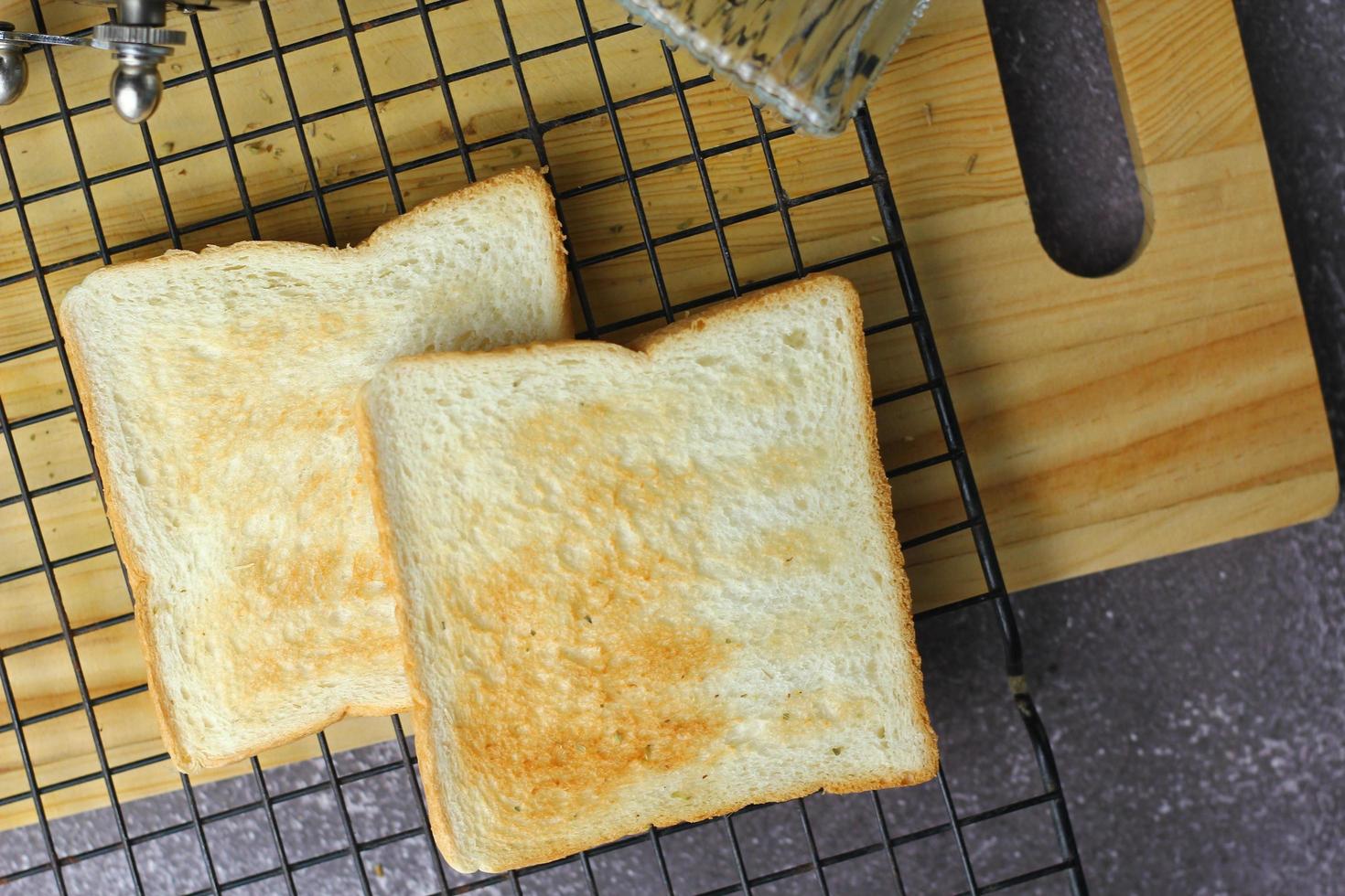 Two freshly made toasts are ready to be served on the table, pictured above. photo