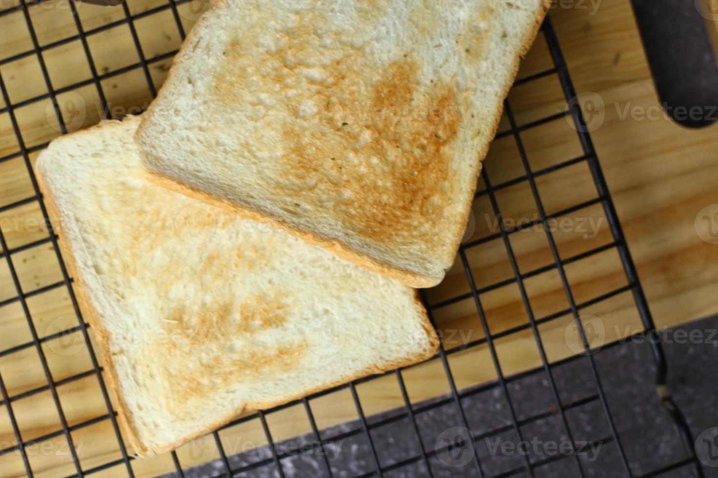 Two freshly made toasts are ready to be served on the table, pictured above. photo