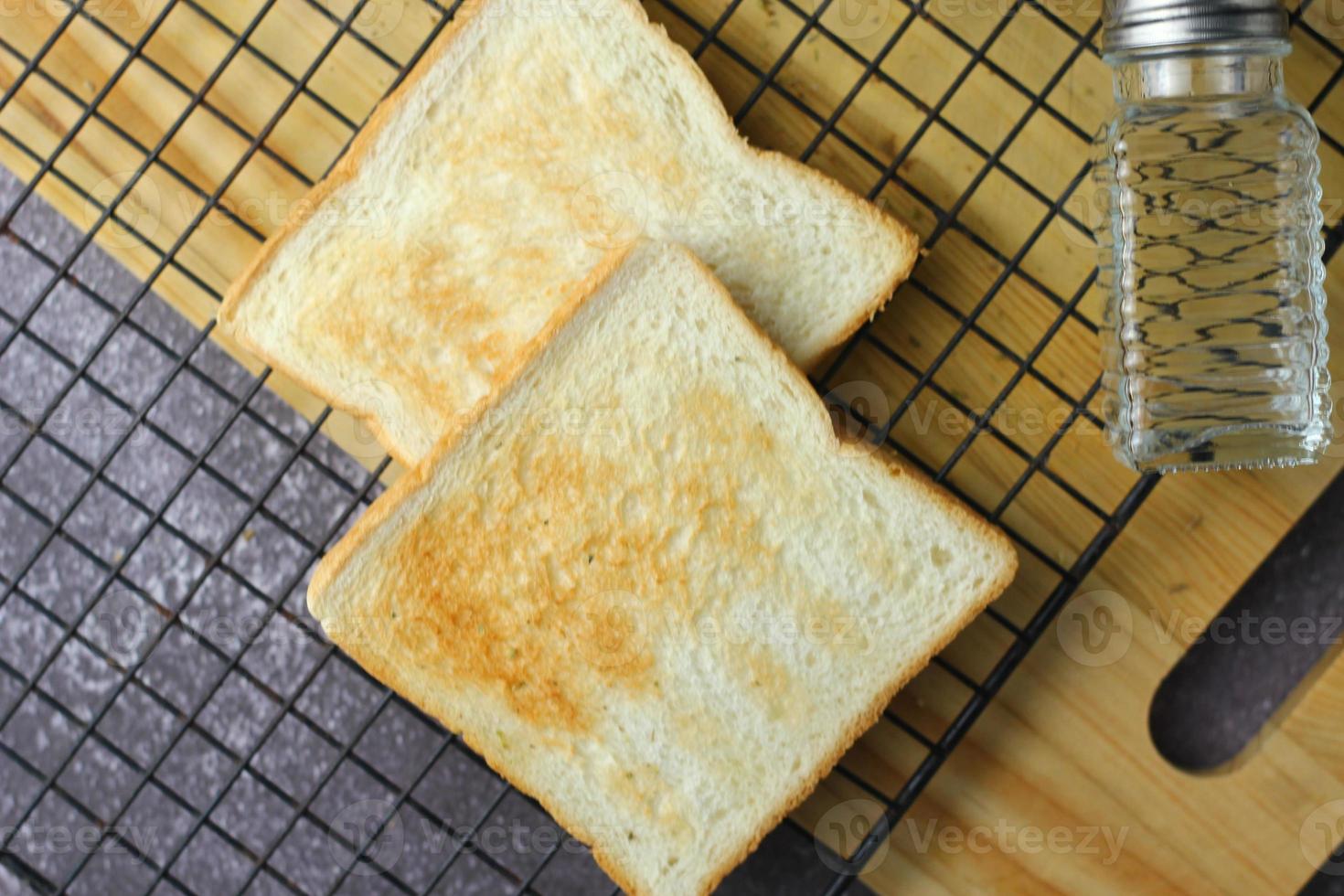 Two freshly made toasts are ready to be served on the table, pictured above. photo