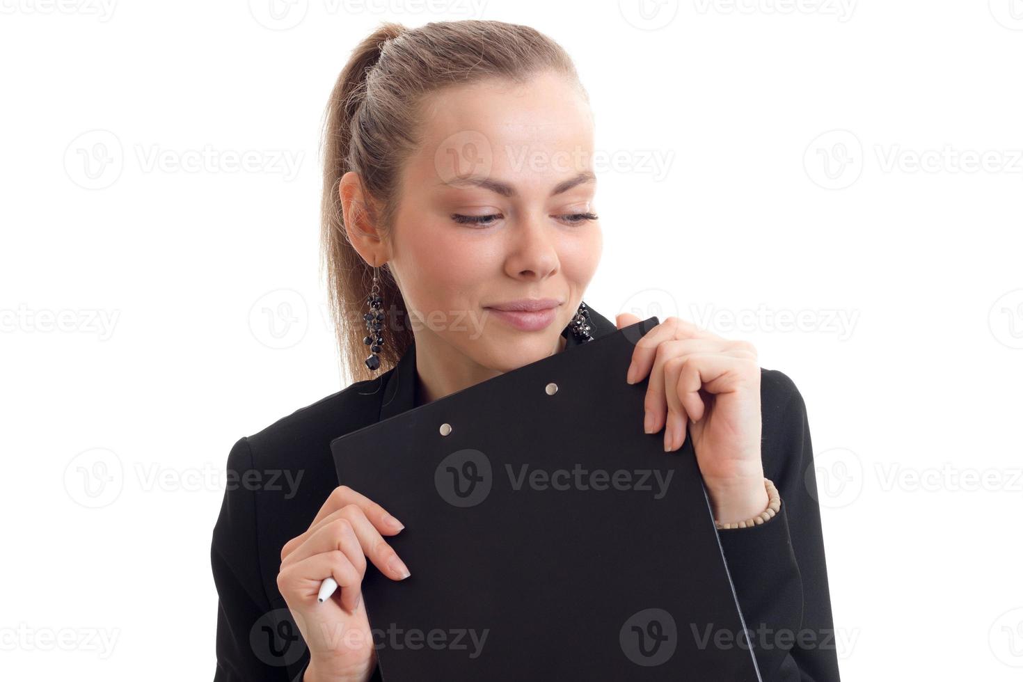 a close-up portrait of sexual business blonde with the tablet in her hands photo