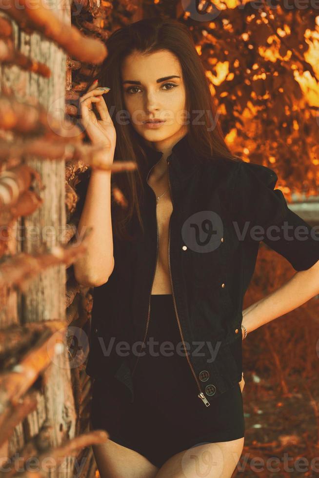 beautiful gentle girl in black shorts and top photo
