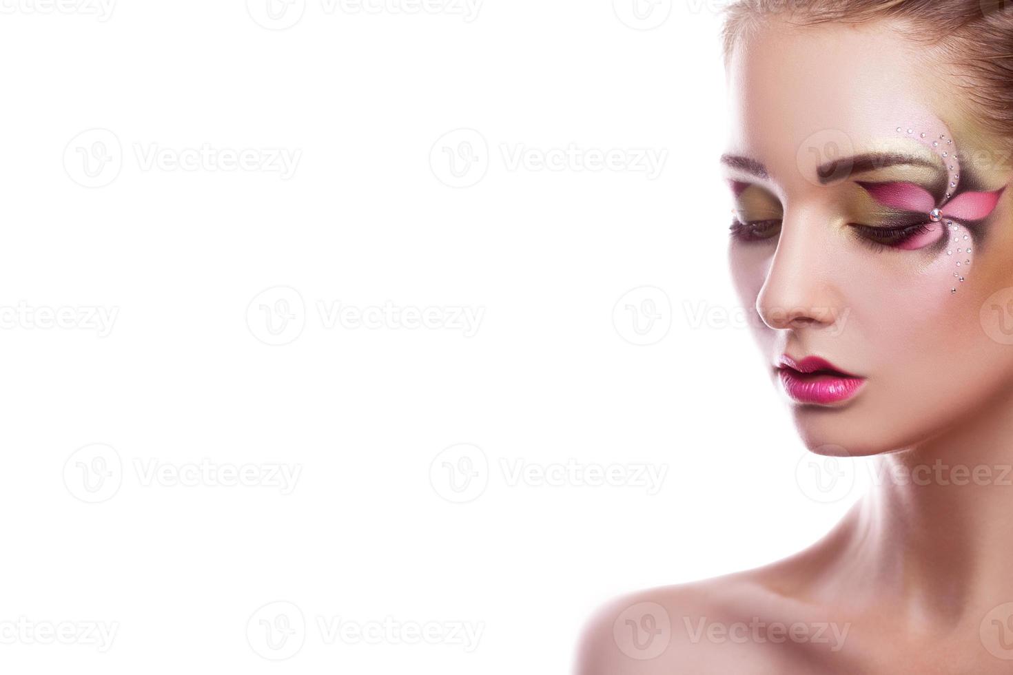 Horizontal photo of cutie young girl with professional make up in studio