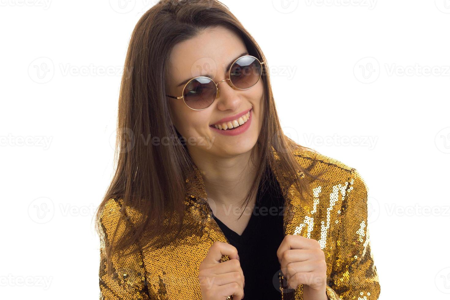 close-up portrait of a glamorous young girl in a bright jacket and glasses photo