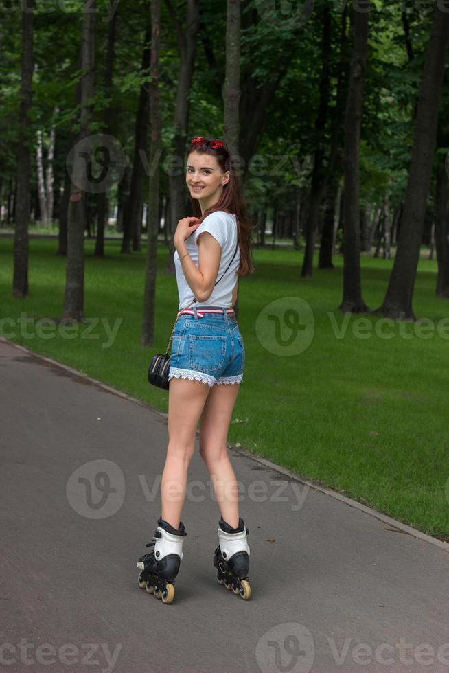 happy young girl rollerblading photo