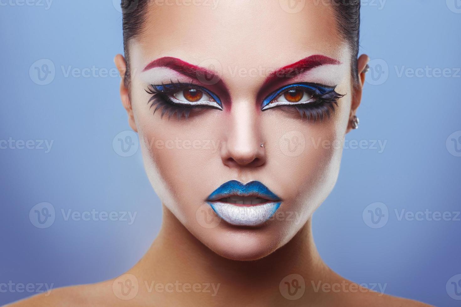 Lovely adult woman with make up looking at camera photo