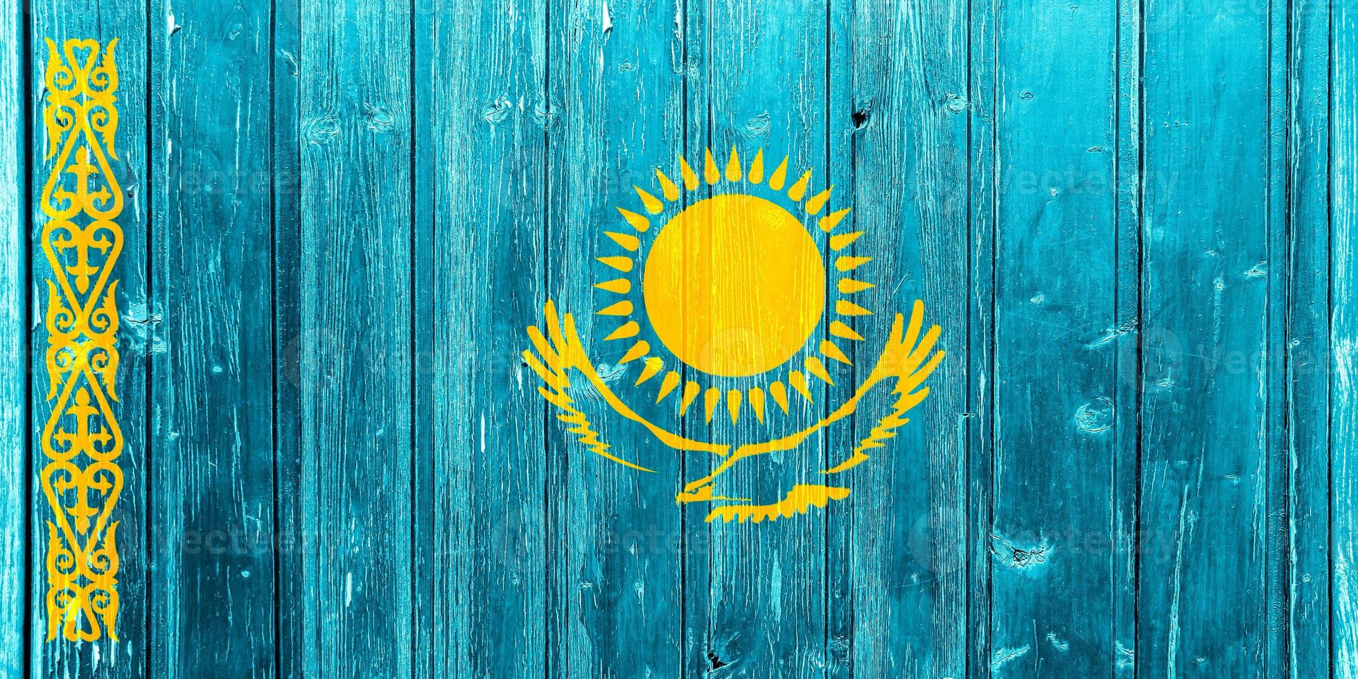 Flag of Kazakhstan on a textured background. Concept collage. photo