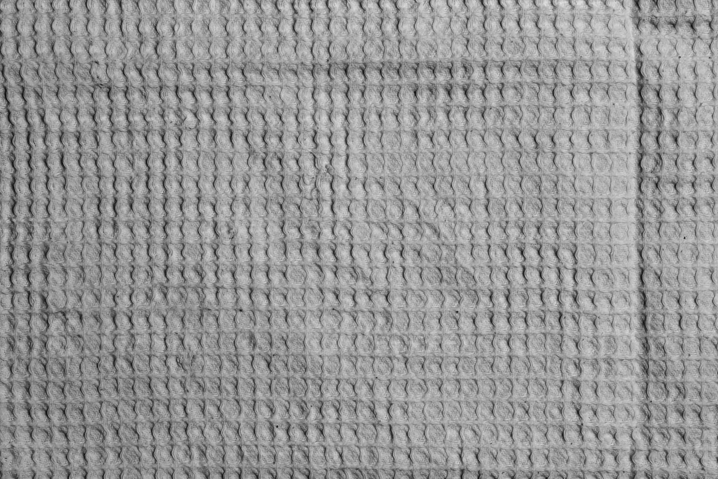 White cotton waffle fabric texture as background photo