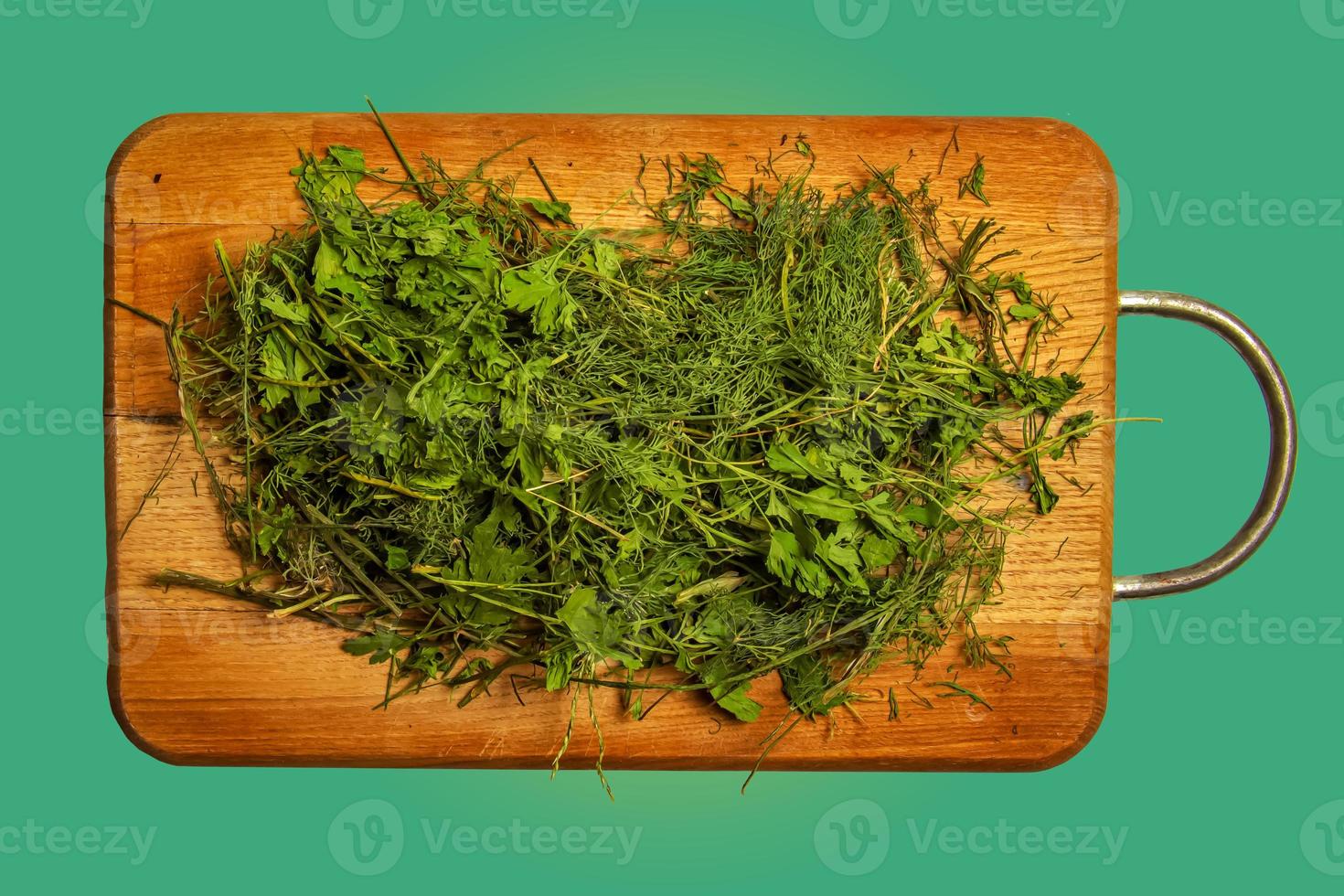 Dried chopped dill and parsley leaves as a natural background. Spices. Healthy food concept. photo