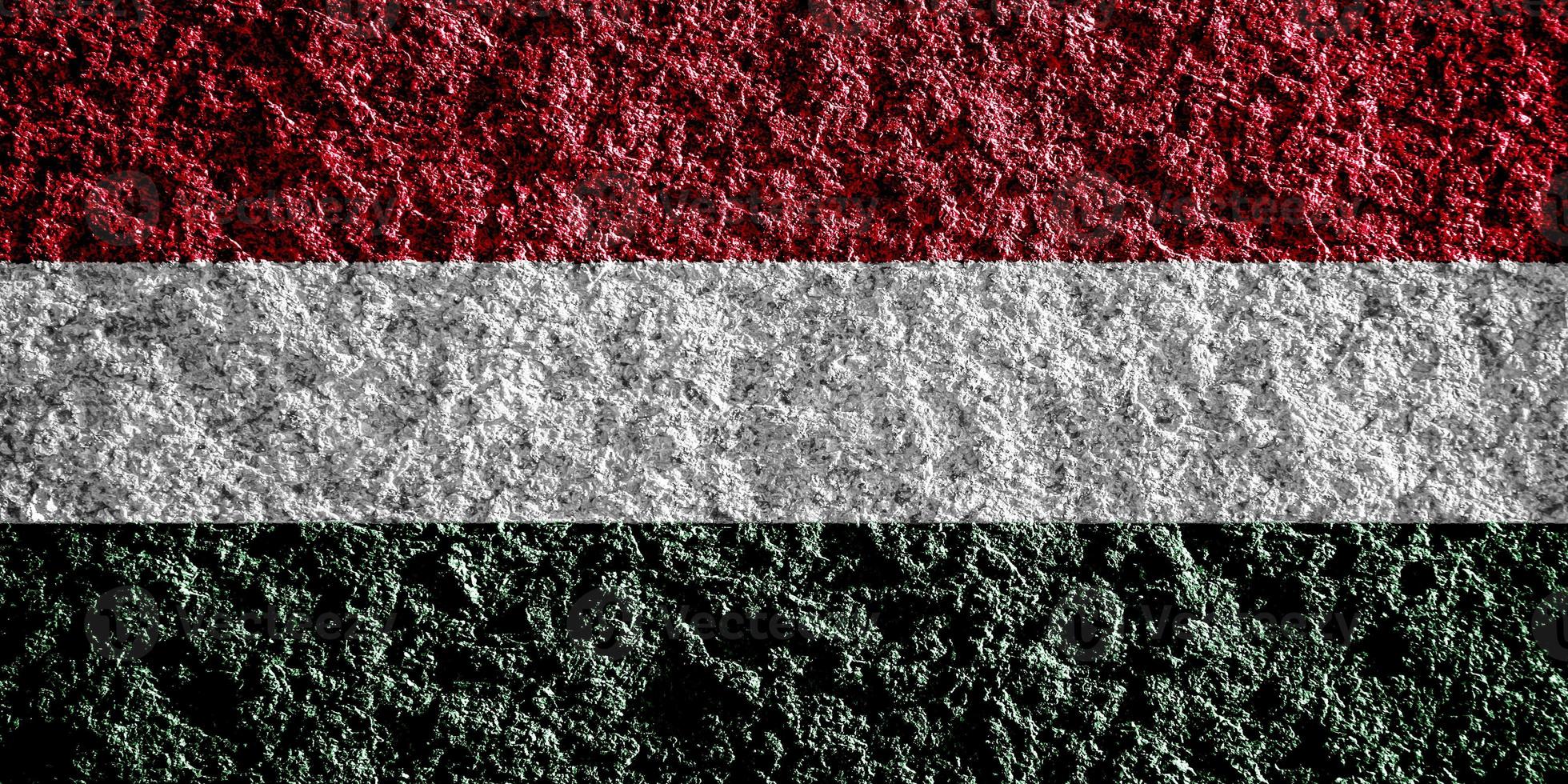 Hungary flag on a textured background. conceptual collage. photo