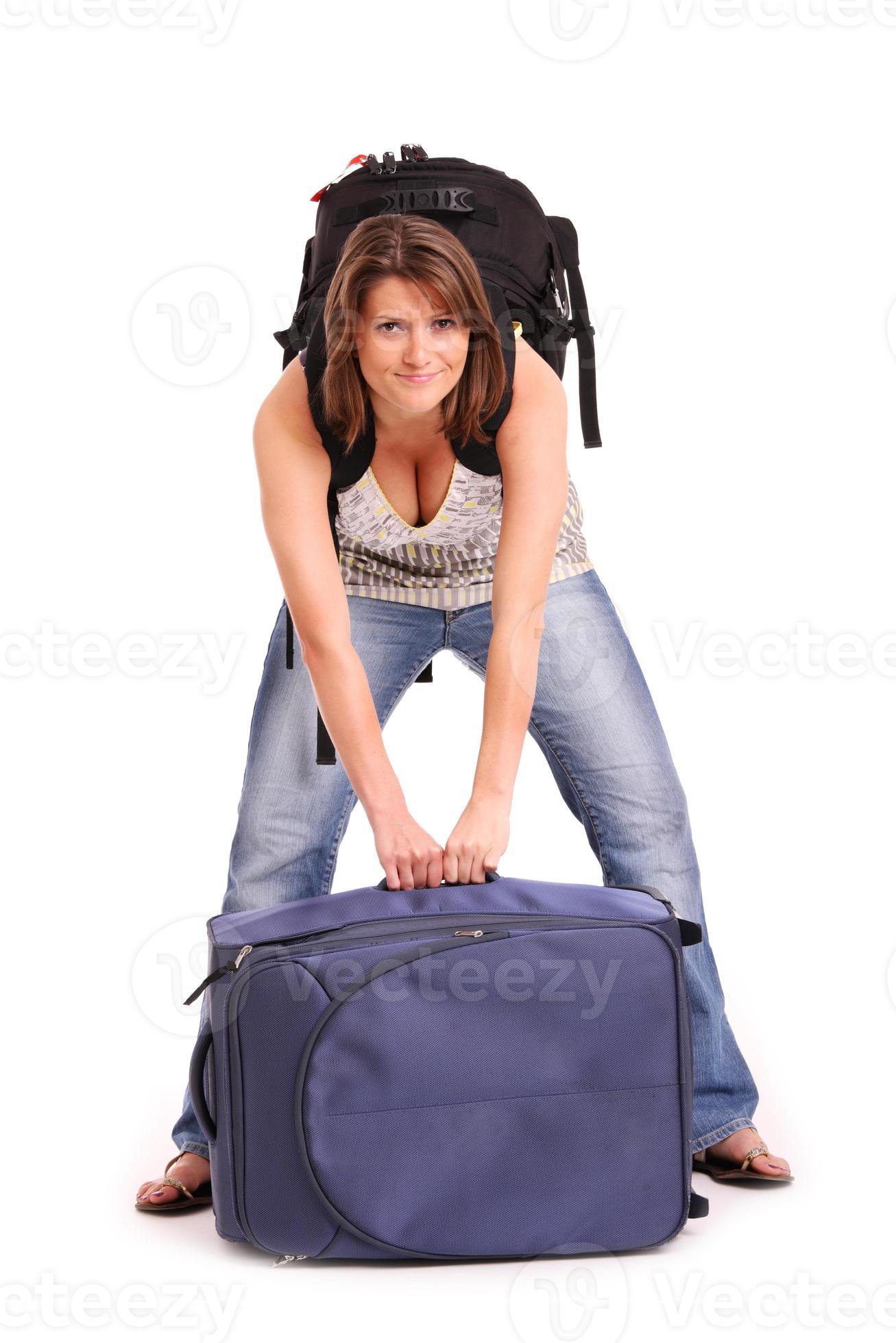 Woman carrying a heavy bag 16552017 Stock Photo at Vecteezy