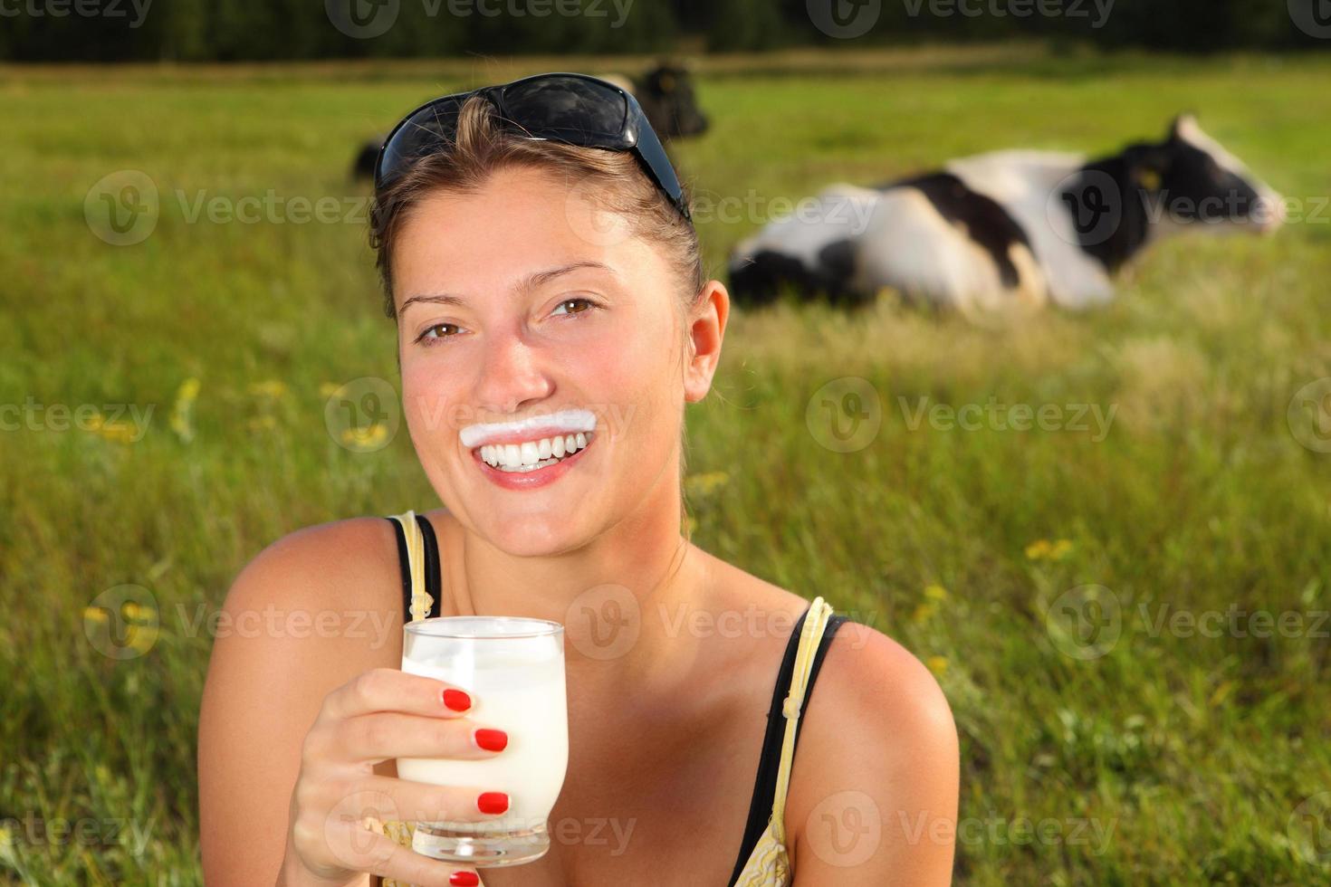 Woman drinking Fresh milk photo