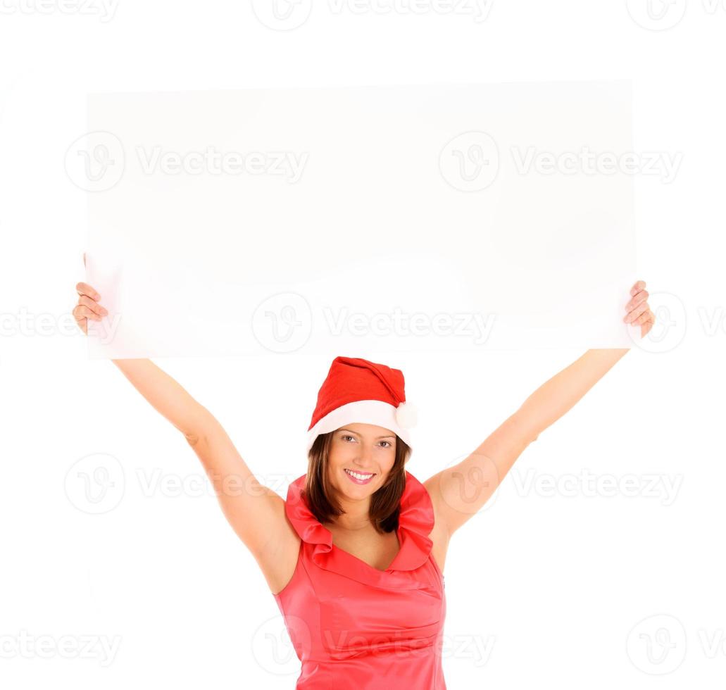 mujer con gorro de santa para navidad foto