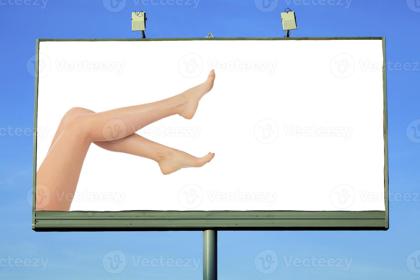 billboard with female legs and a space for your message photo