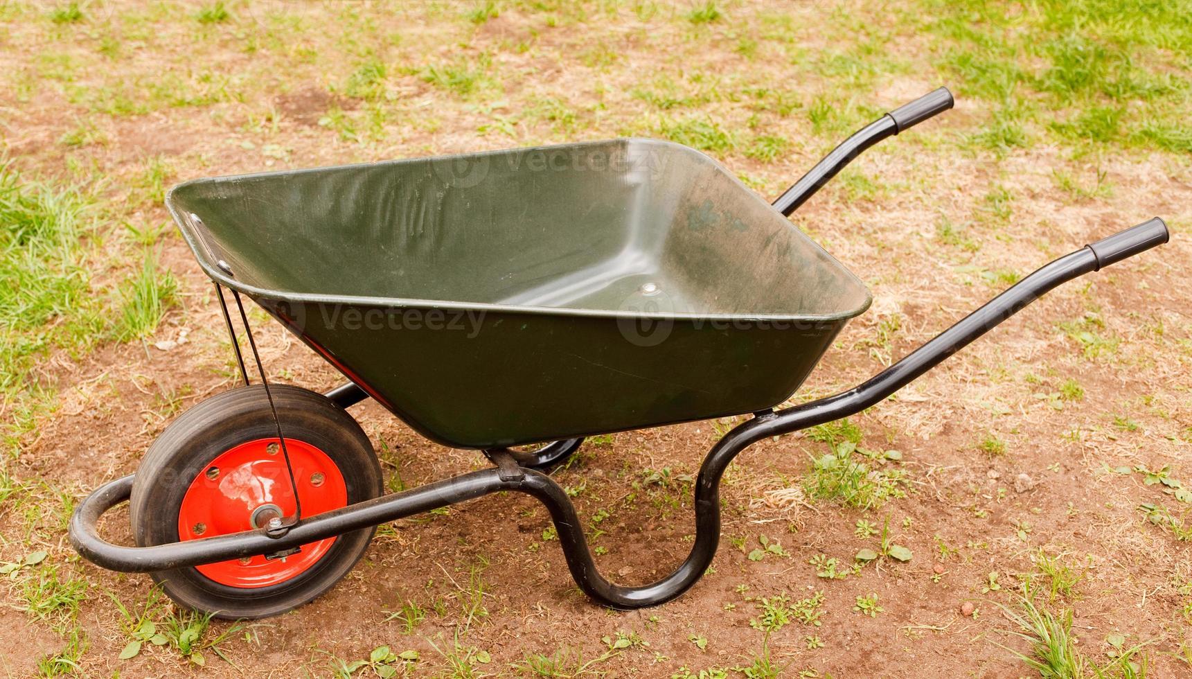 Wheelbarrow in a garden photo