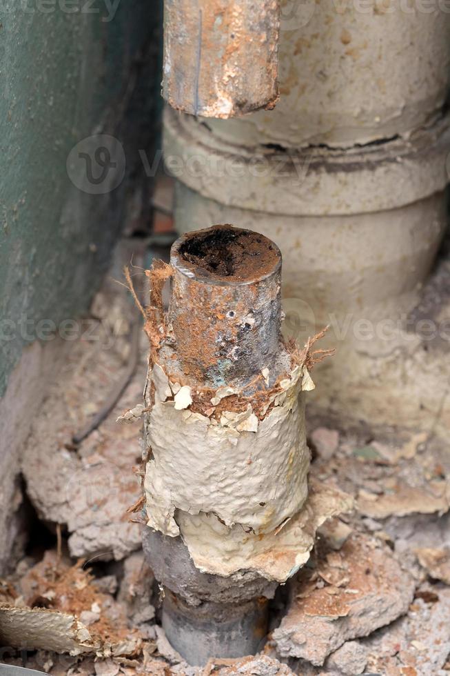 Old water pipe clogged with rust photo