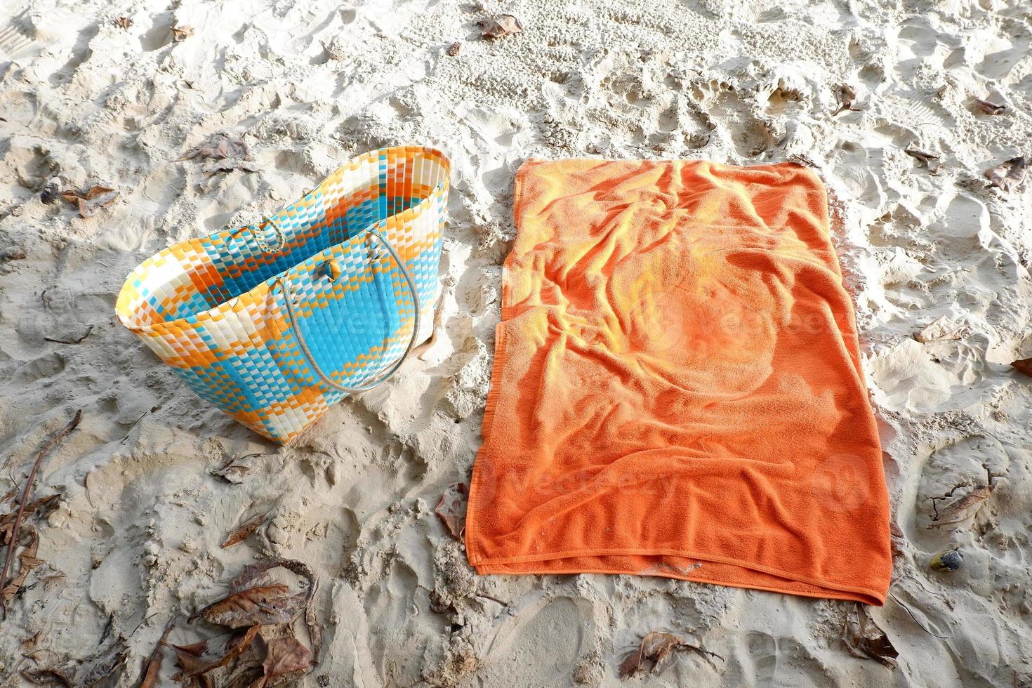 Beach accessories for woman sunbath, orange and blue color photo