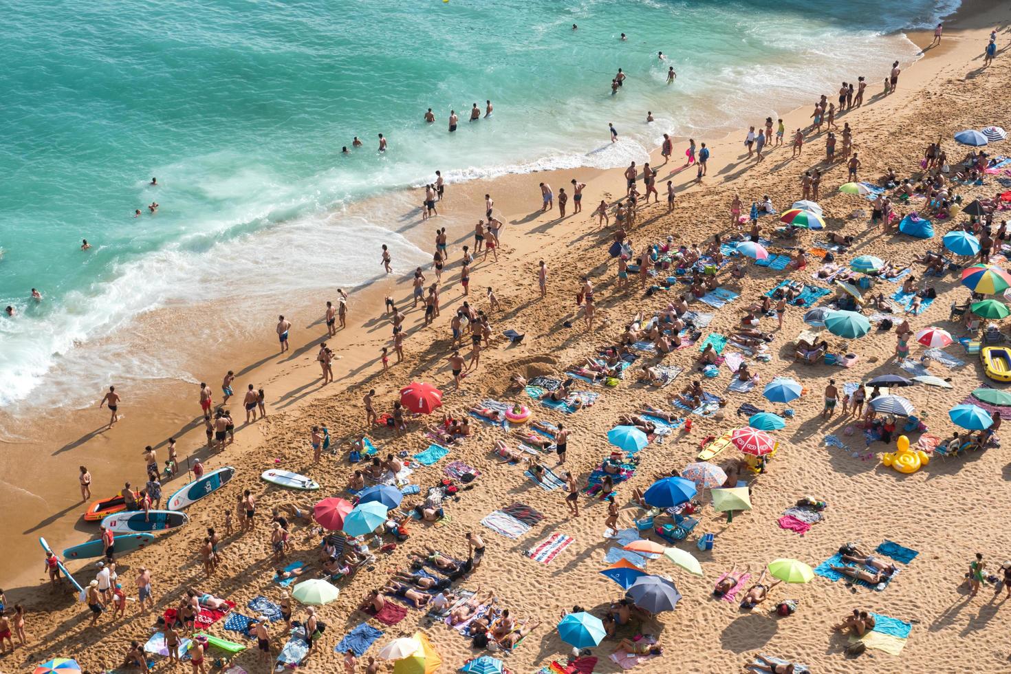 Algarve,Portugal-august 13, 2017-people on the beach in the Algarve coast in Portugal during a sunny day photo
