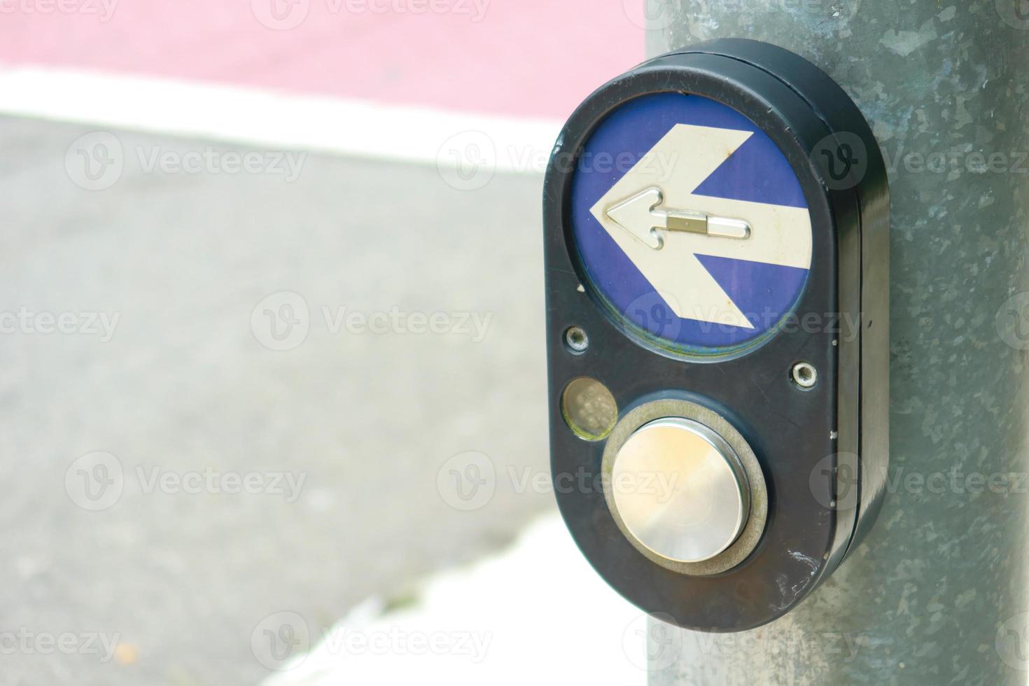 close up of crossing signal button in singapore photo